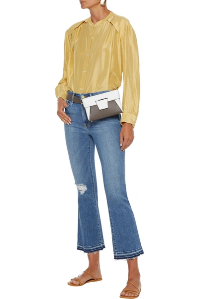 Shop Frame Le Crop Mini Boot Distressed Mid-rise Kick-flare Jeans In Mid Denim