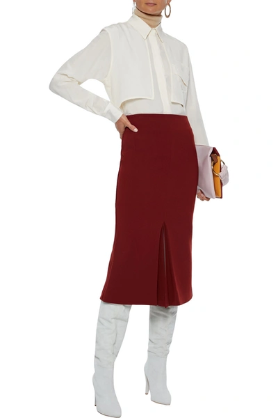 Shop Victoria Beckham Pleated Bonded Crepe Midi Skirt In Brick