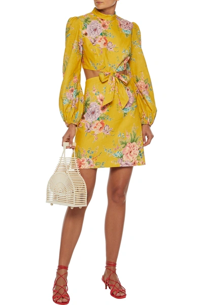 Shop Zimmermann Zinnia Bow-embellished Cutout Floral-print Linen And Cotton-blend Mini Dress In Saffron