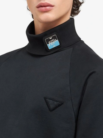 Shop Prada Saffiano Leather Trim Logo Pin In Black