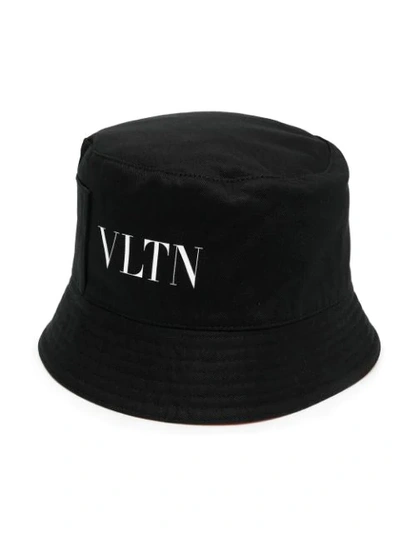 Shop Valentino Reversible Vltn Bucket Hat In Black