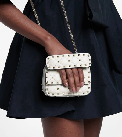Shop Valentino Rockstud Spike Micro Leather Crossbody Bag In White