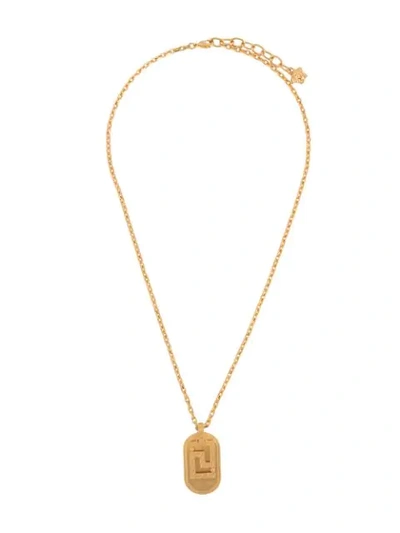 Shop Versace Greca Pendant Necklace In Gold