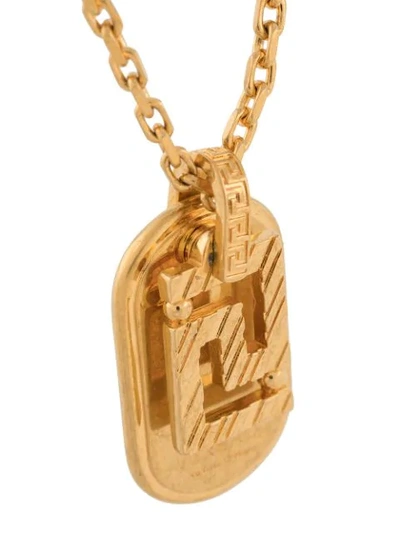Shop Versace Greca Pendant Necklace In Gold