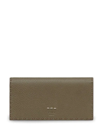 Shop Fendi Logo Embossed Continental Wallet In Green