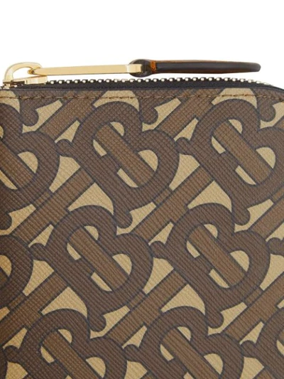 Shop Burberry Monogram Ziparound Phone Wallet In Brown