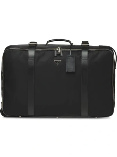 Shop Prada Logo Plaque Suitcase In Black