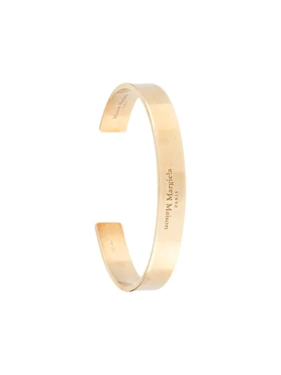 Shop Maison Margiela Logo Engraved Bangle In Gold