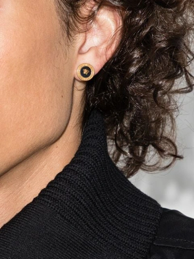 GOLD TONE AND BLACK SMALL MEDUSA EARRINGS