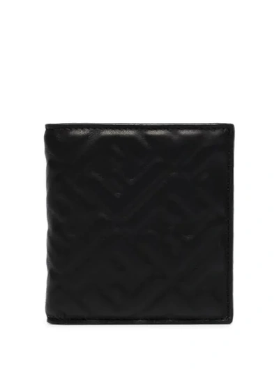 Shop Fendi Logo Embossed Billfold Wallet In Black