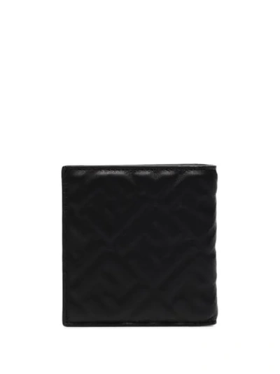 Shop Fendi Logo Embossed Billfold Wallet In Black