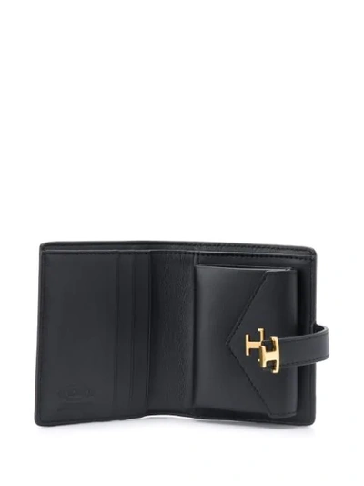 Shop Tod's Leather Foldover Wallet In Black