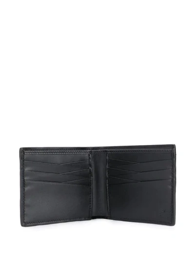 Shop Gucci Gg Embossed Wallet In Black