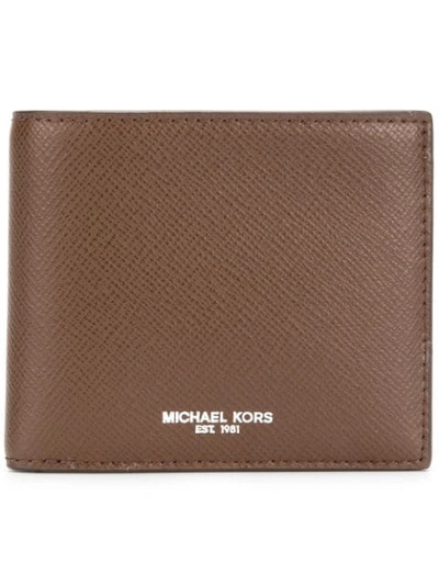 Shop Michael Kors Logo Print Wallet In Brown