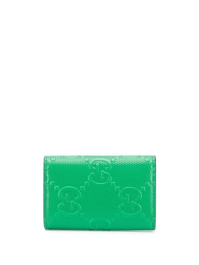 Shop Gucci Gg Embossed Folding Keycase In Green