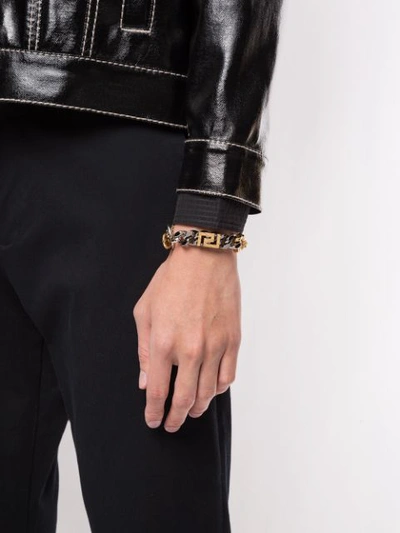 Shop Versace Two-tone Logo Motif Bracelet In Gold