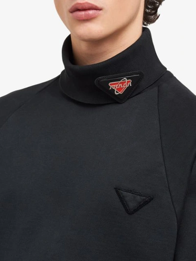 Shop Prada Enamelled Triangular Logo Pin In Black