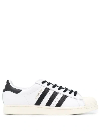 Shop Adidas Originals Superstar Low-top Trainers In White