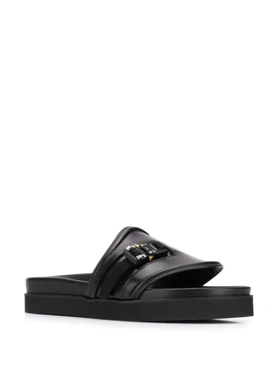 Shop Alyx Rollercoaster Buckle Slides In Black