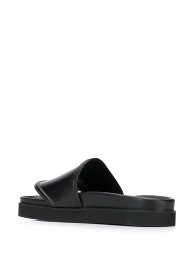 Shop Alyx Rollercoaster Buckle Slides In Black