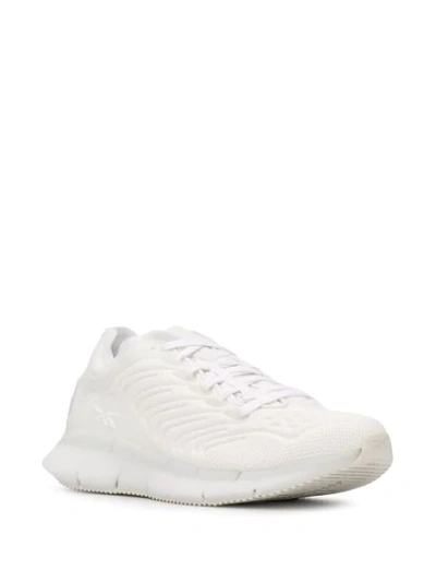 Shop Reebok Zig Kinetica Sneakers In White