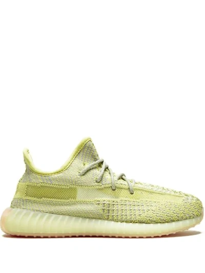 Shop Adidas Originals Yeezy Boost 350 V2 Sneakers In Yellow