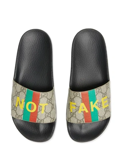 Shop Gucci Fake/not Print Slides In Neutrals