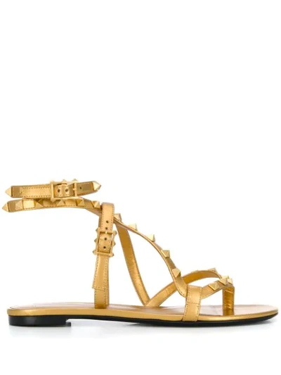 Shop Valentino Rockstud Flair Sandals In Gold