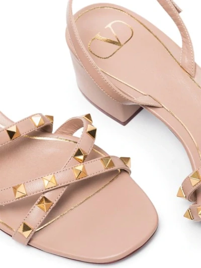 Shop Valentino Rockstud Flair 45mm Sandals In Neutrals