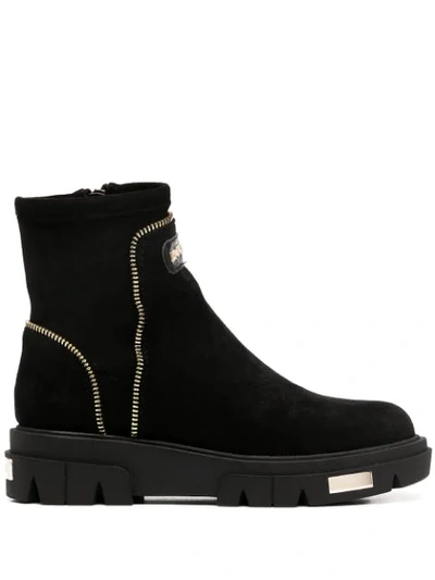 Shop Dkny Zip Trim Ankle Boots In Black