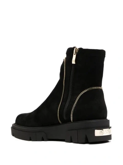 Shop Dkny Zip Trim Ankle Boots In Black