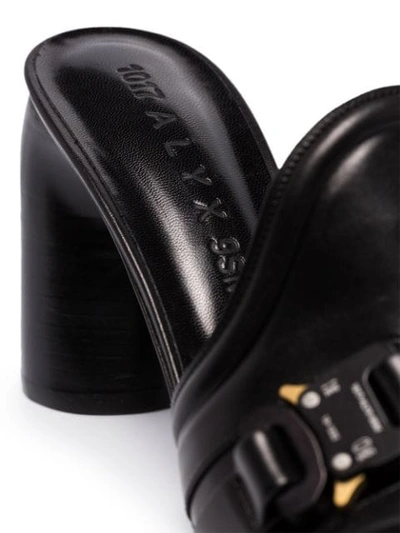 Shop Alyx Buckle-detailed Leather Mules In Black