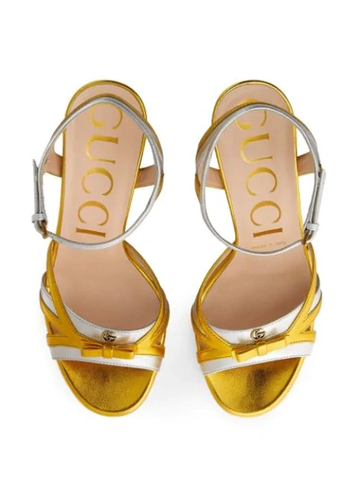 Shop Gucci Metallic Strappy Platform Sandals In Gold
