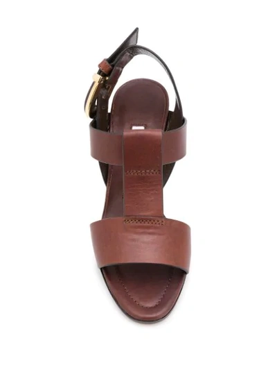 Shop Manolo Blahnik T-strap Buckled Sandals In Black