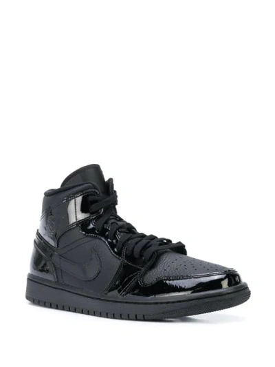 Shop Nike Air Jordan 1 Mid Triple Black