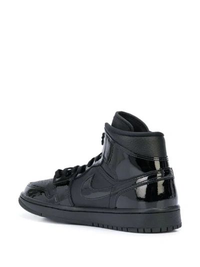 Shop Nike Air Jordan 1 Mid Triple Black