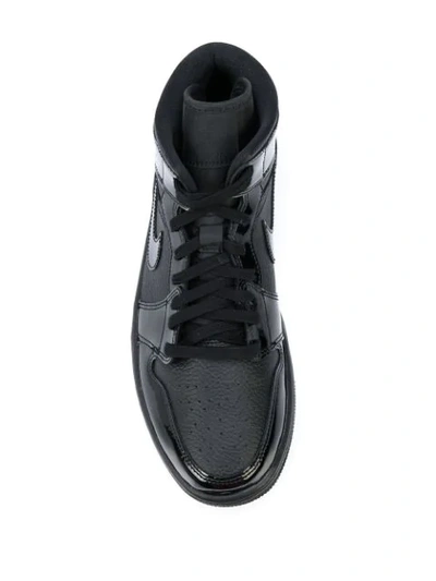 Shop Nike Air Jordan 1 Mid Triple Black