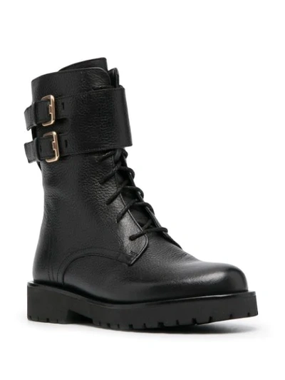 Shop Twinset Buckled Combat Boots In Black