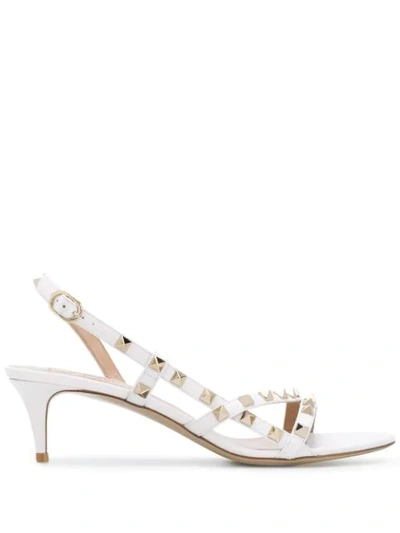 Shop Valentino Rockstud Slingback Sandals In White