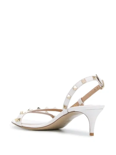 Shop Valentino Rockstud Slingback Sandals In White