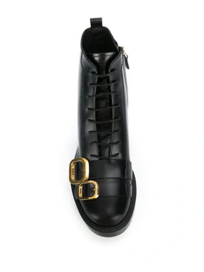 Shop Tod's Lace Up Ankle Boots With Buckle Detailing In Black