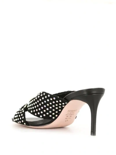 Shop Schutz Stud-embellished Mules In Black