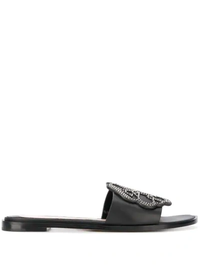 Shop Alexander Mcqueen Stud-embellished Flat Sandals In Black