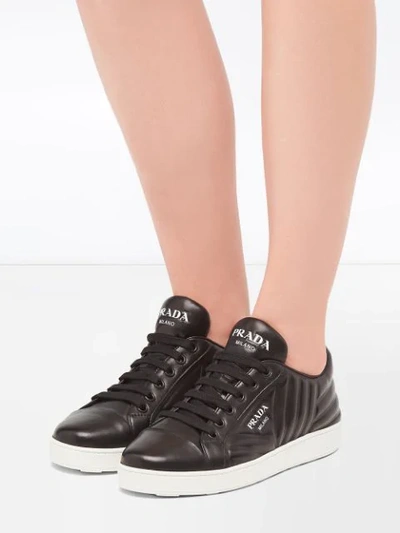 Shop Prada Quilted Low-top Sneakers In Black