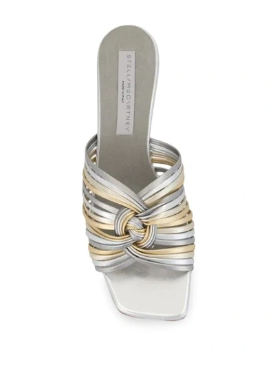 Shop Stella Mccartney Strappy Knot Mules In Silver