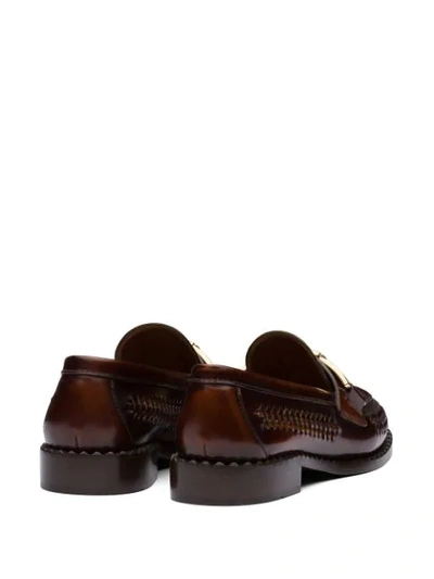 Shop Prada Buckled Woven Loafers In Brown