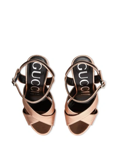 Shop Gucci Metallic-finish Cross-strap 104mm Sandals In Pink