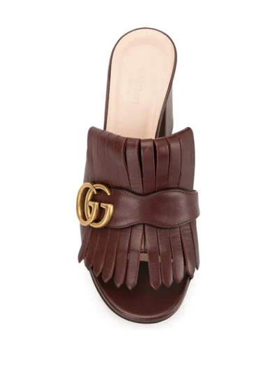 Shop Gucci Double G Mules In Brown