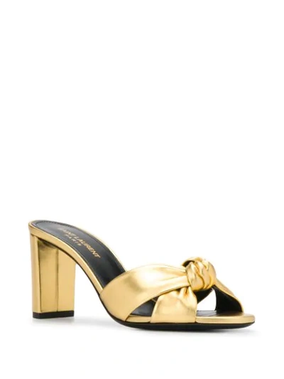 Shop Saint Laurent Bianca Knotted Detail 85mm Mules In Gold