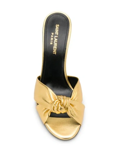 Shop Saint Laurent Bianca Knotted Detail 85mm Mules In Gold